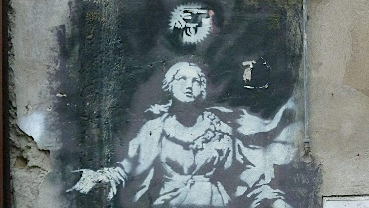 La Madonna Con Pistola L opera Italiana Di Banksy In Pericolo la-madonna-con-pistola-l-opera-italiana-di-banksy-in-pericolo